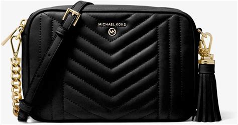 michael michael kors jet set medium quilted leather camera bag|Michael Kors jet set charm.